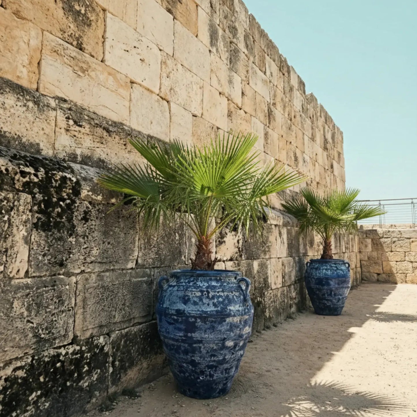 Blue Atlantis jar pot with a smooth, rounded ceramic design, ideal for decorative or functional use in home decor.