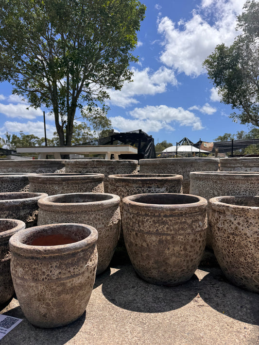 The Nurso Atlantis Banded Egg Pot Cream jar with a decorative band and a lid, showcasing elegant packaging.