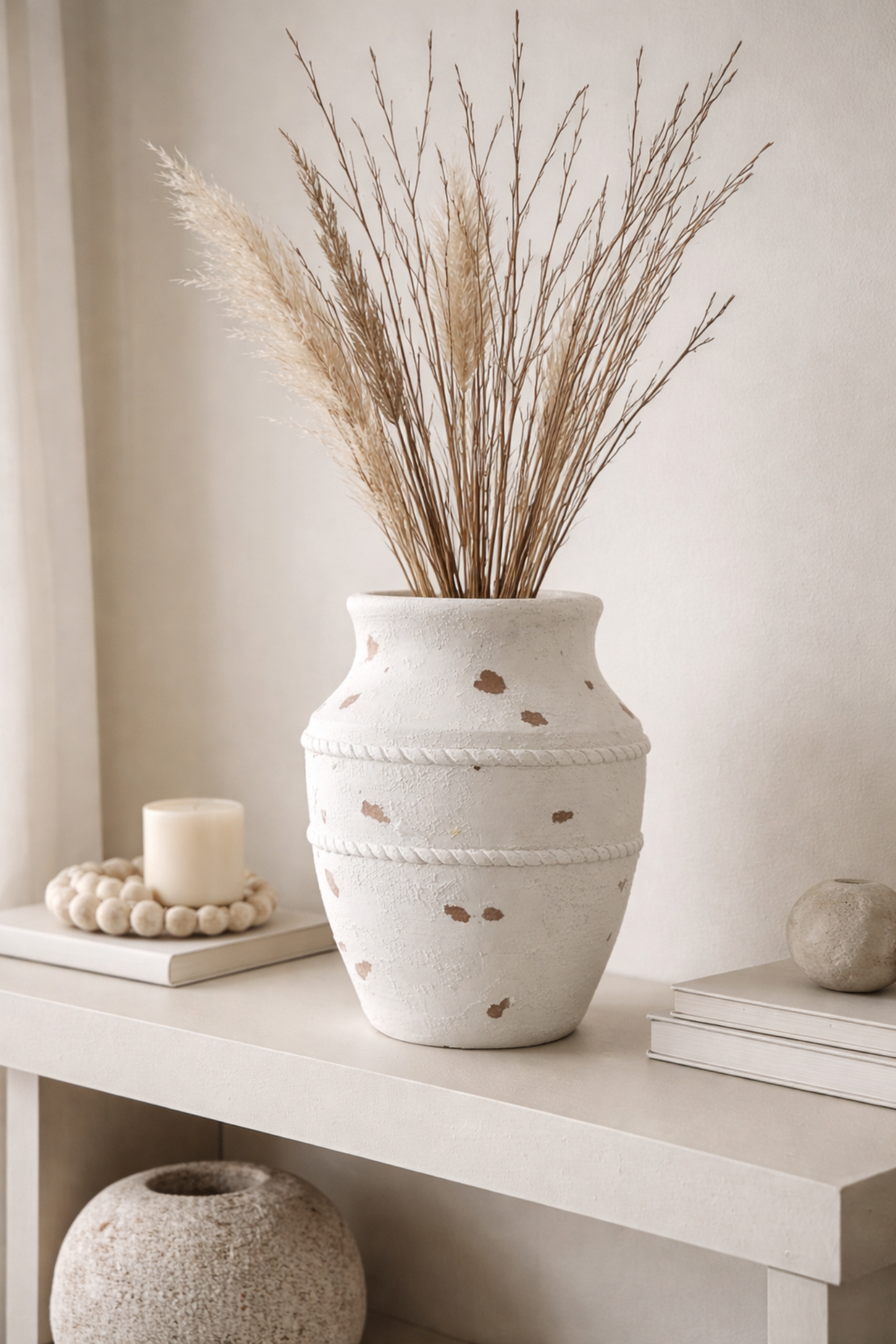 A rustic Tuscan Craté Pot by The Nurso, featuring a textured clay surface with a classic, earthy design suitable for indoor or outdoor use.