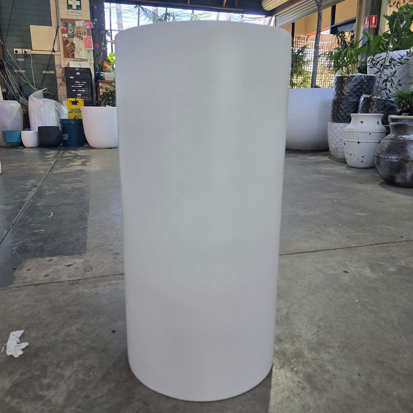 Tall white cedar cylinder vase by The Nurso, featuring a sleek, modern design perfect for home decor or floral arrangements.