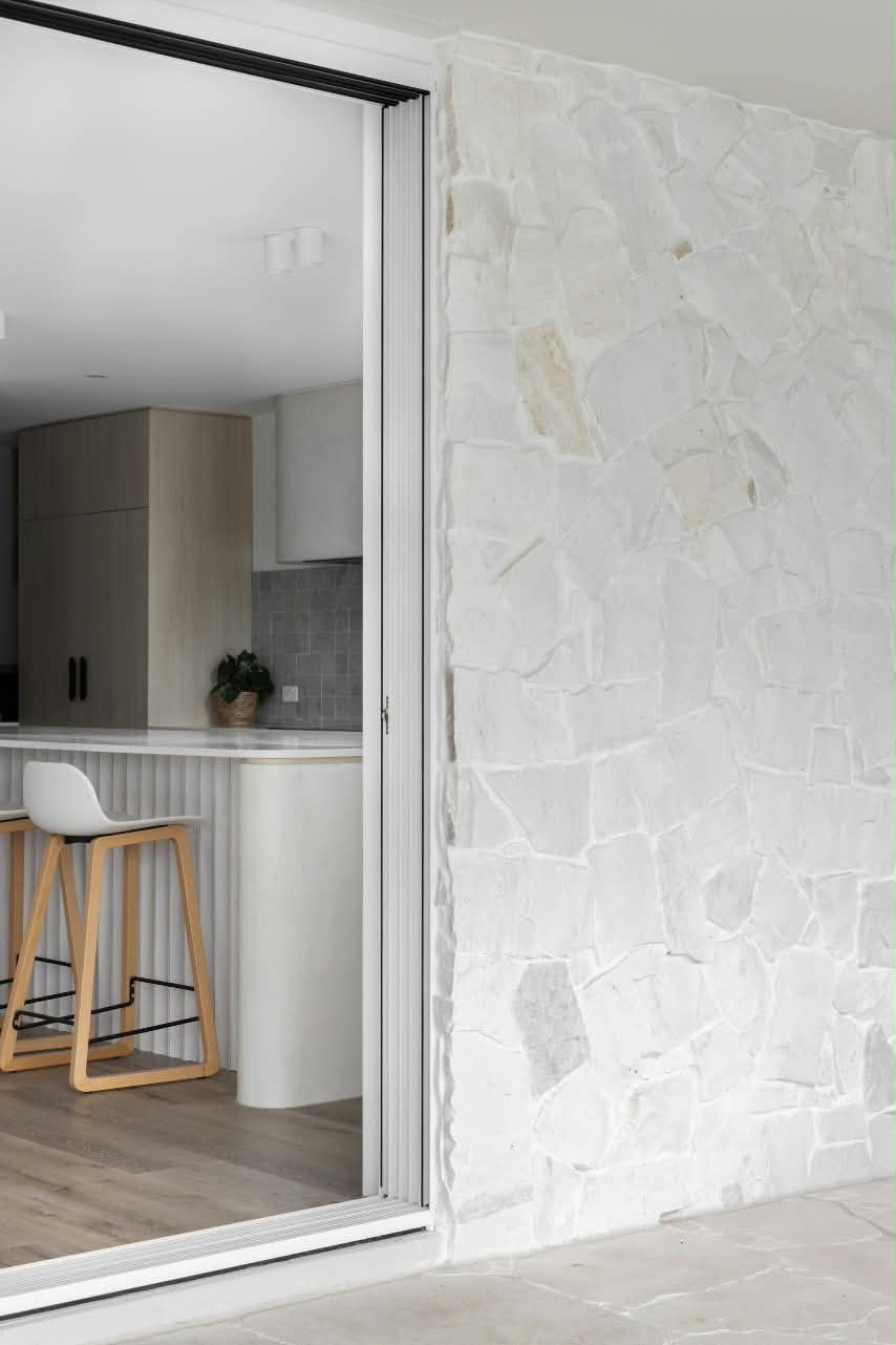White marble stone cladding by The Nurso, showing polished surface and natural veining for interior or exterior wall decoration.