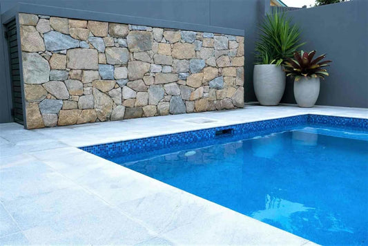 Close-up of The Nurso tiger skin stone with grey tones, showcasing its textured, natural tiger stripe pattern.