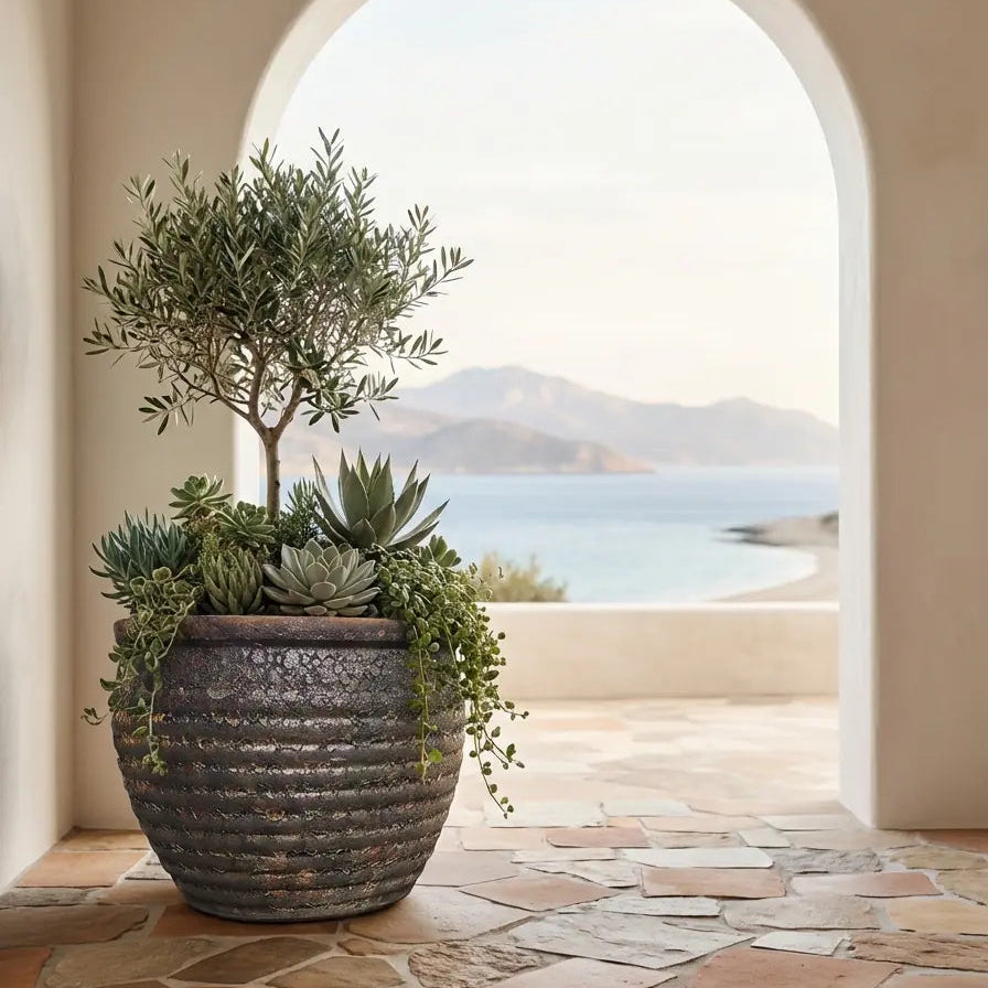 Bronze Atlantis ribbed pot with a textured surface, featuring a modern cylindrical shape and decorative design.