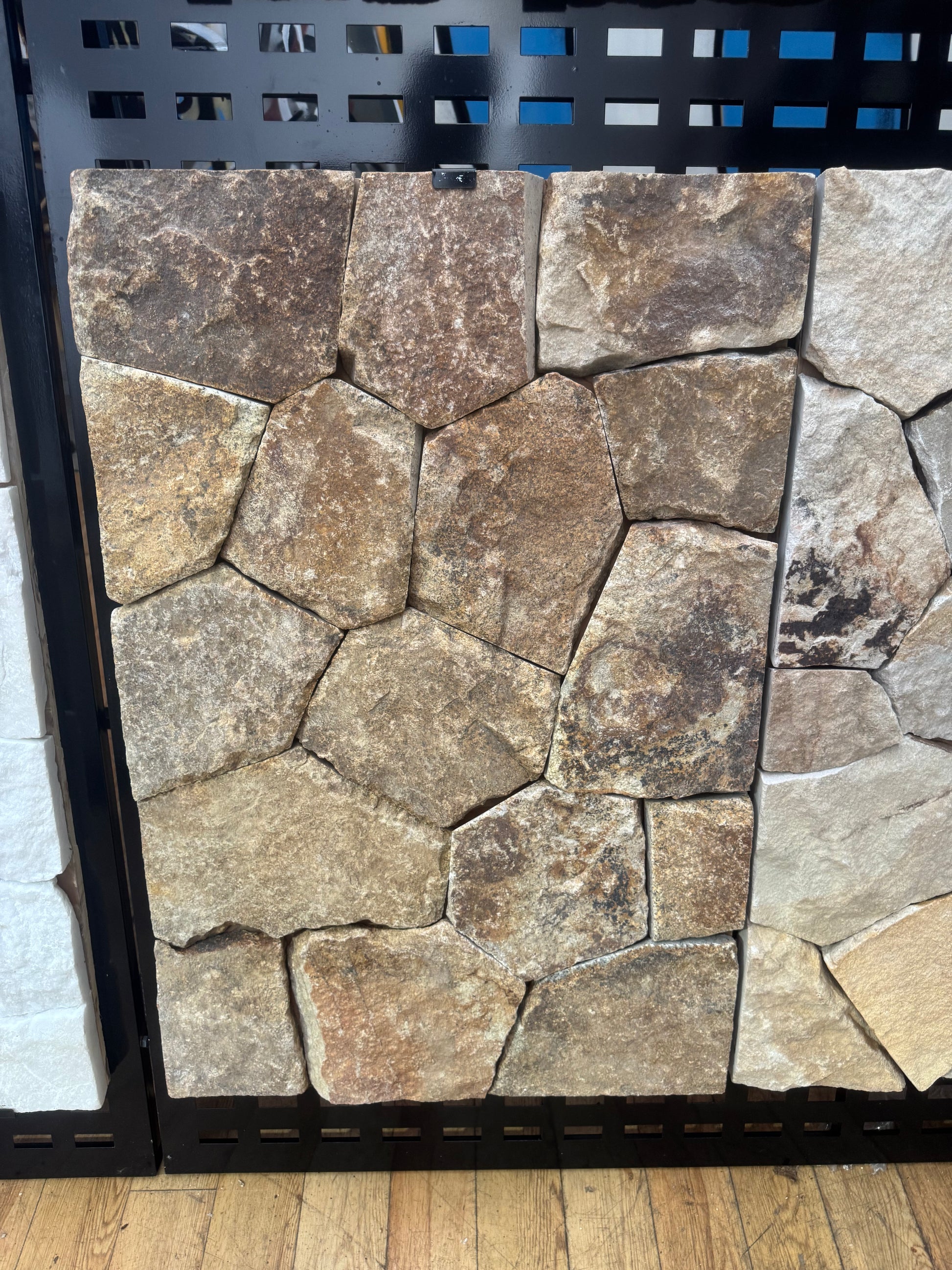 Amber gold sandstone from The Nurso, showcasing smooth, warm-toned mineral with natural textured surface.