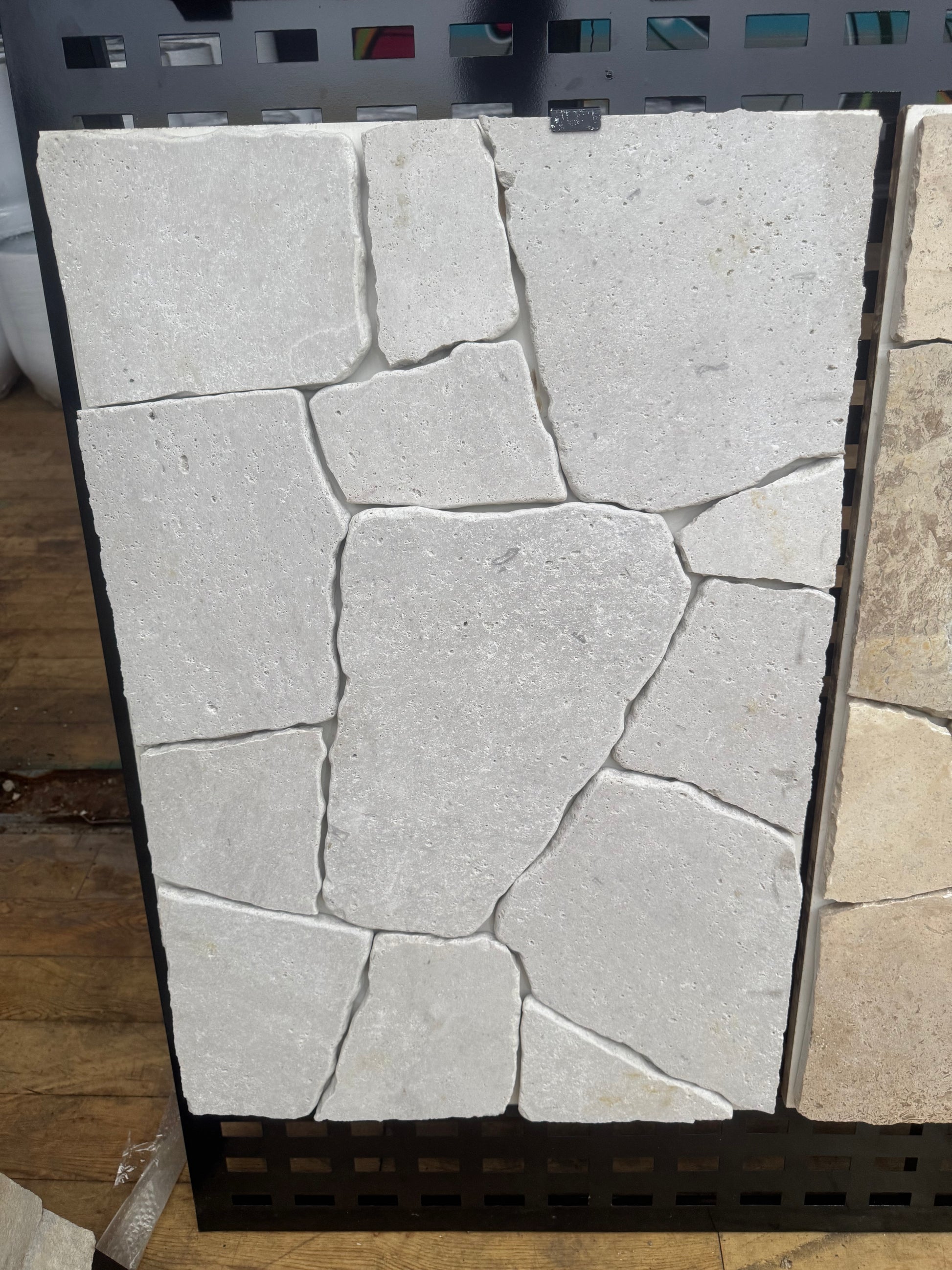 White travertine crazy paving from The Nurso, showing textured irregular stone pattern for outdoor or patio use.