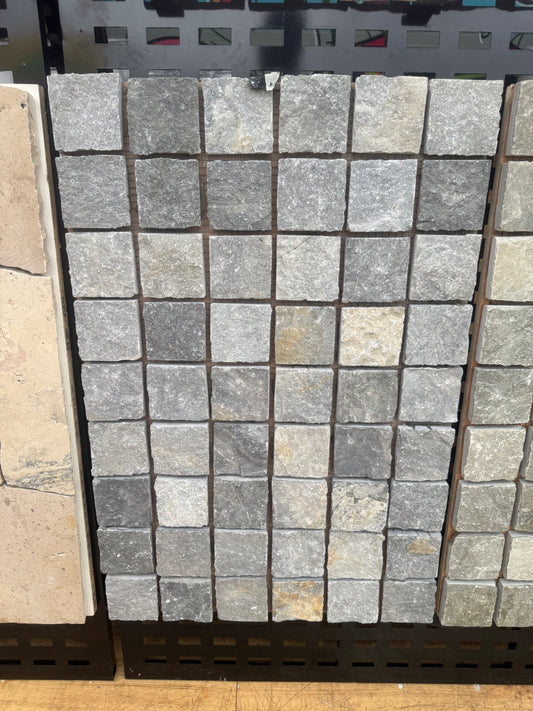 Blue Quartz cobblestones from The Nurso, showing textured blue gemstones with natural variation and polished surfaces.