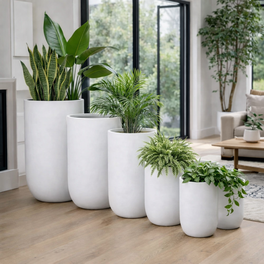 Tall white Tuscan cylinder vase by The Nurso, elegant ceramic design ideal for home decor or floral arrangements.