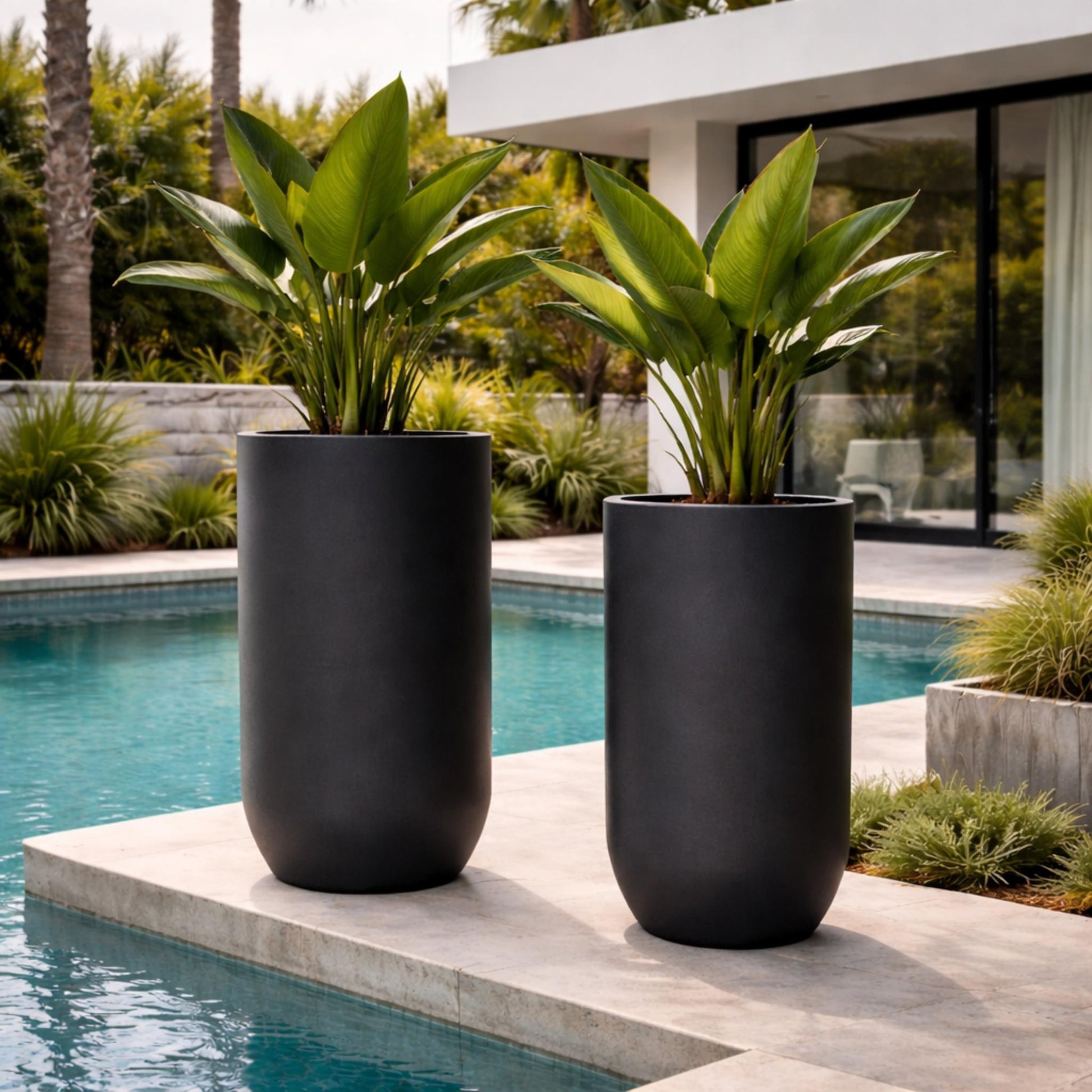 Tall black Tuscan U pot with a sleek, modern design, perfect for indoor or outdoor plants.