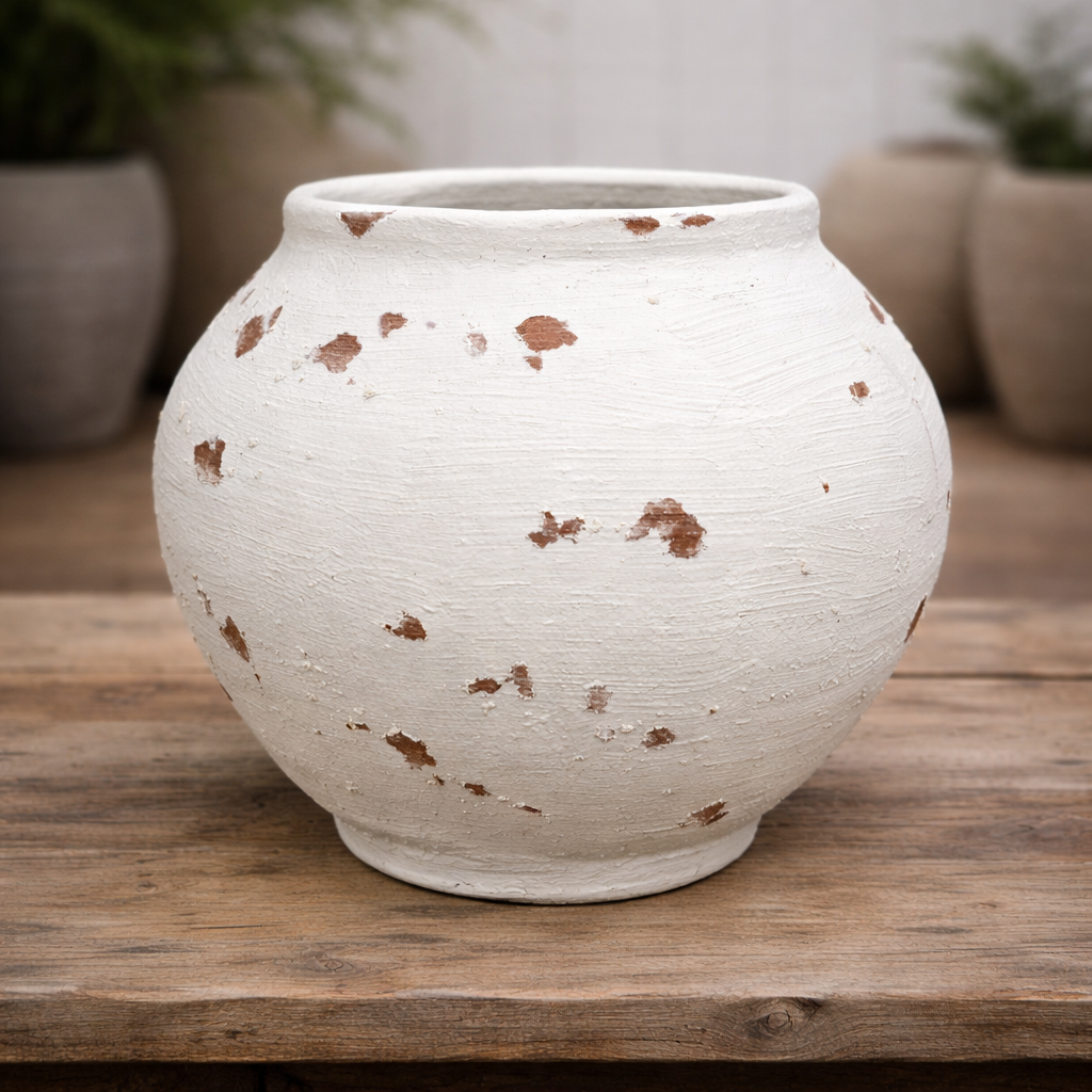 Tuscan Phaté Pot by The Nurso, ceramic plant pot with a rustic, earthy finish and decorative design.