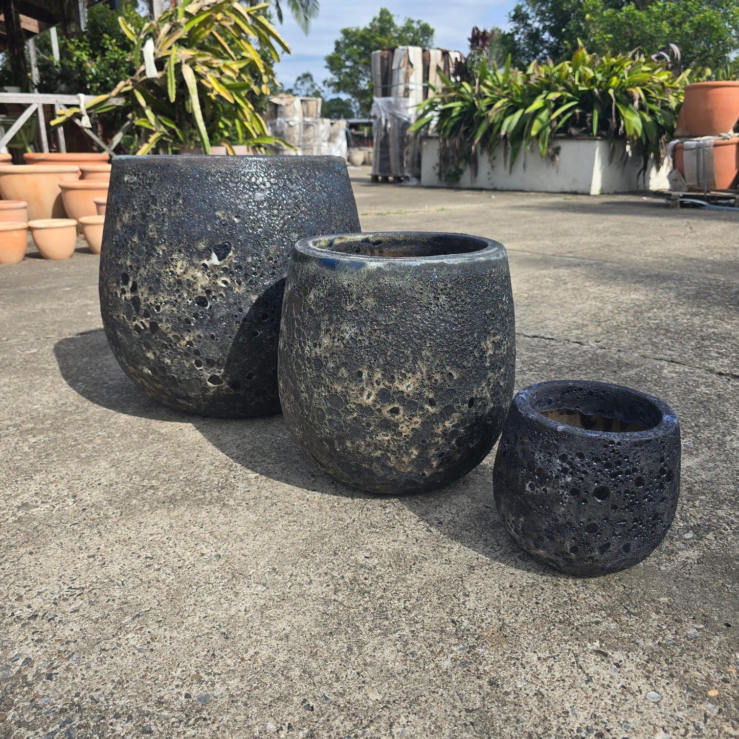 Black Atlantis Belly Egg Pot by Atlantis, 23cm x 21cm, shown with a smooth, rounded shape and glossy black finish.