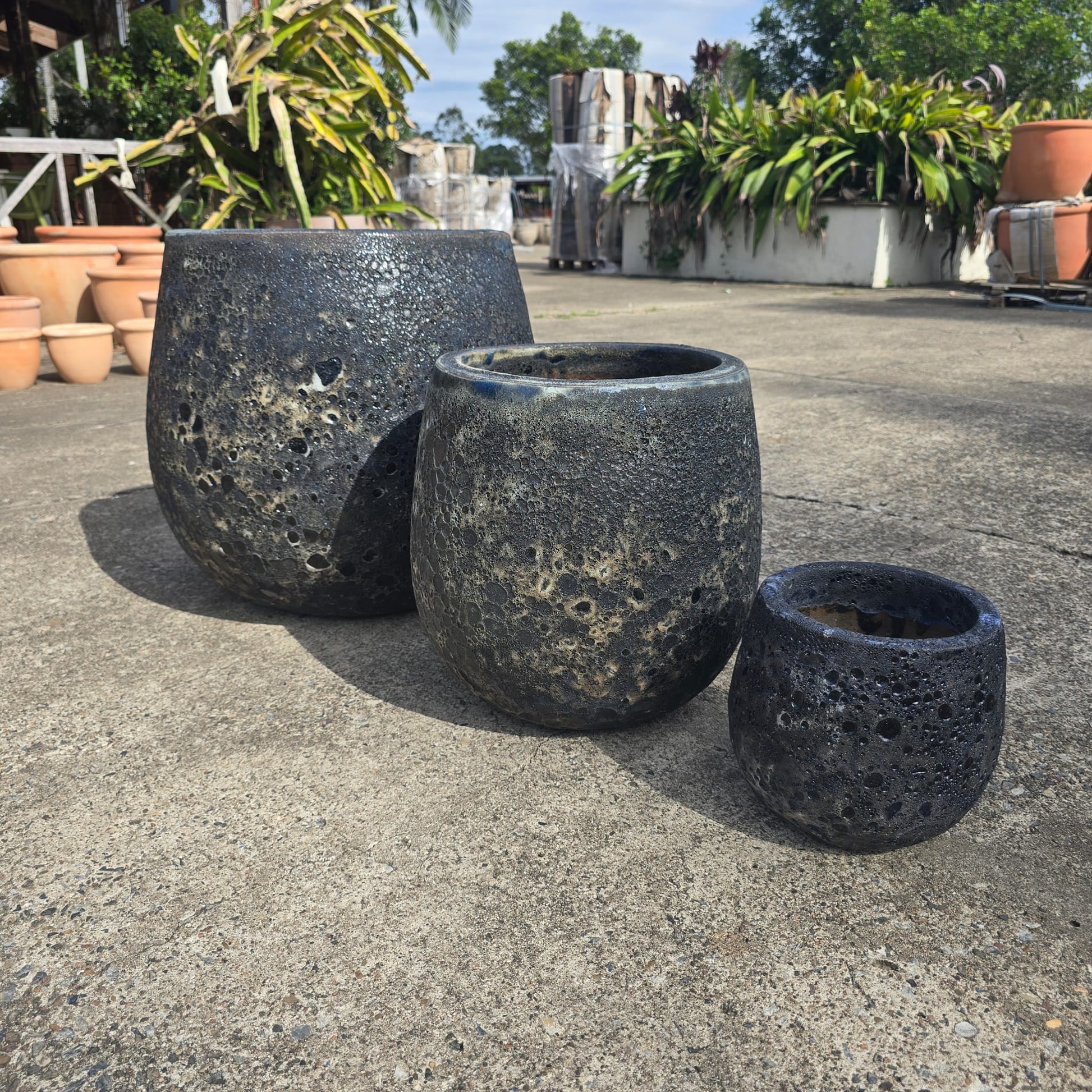 Black Atlantis Belly Egg Pot by Atlantis, 23cm x 21cm, shown with a smooth, rounded shape and glossy black finish.