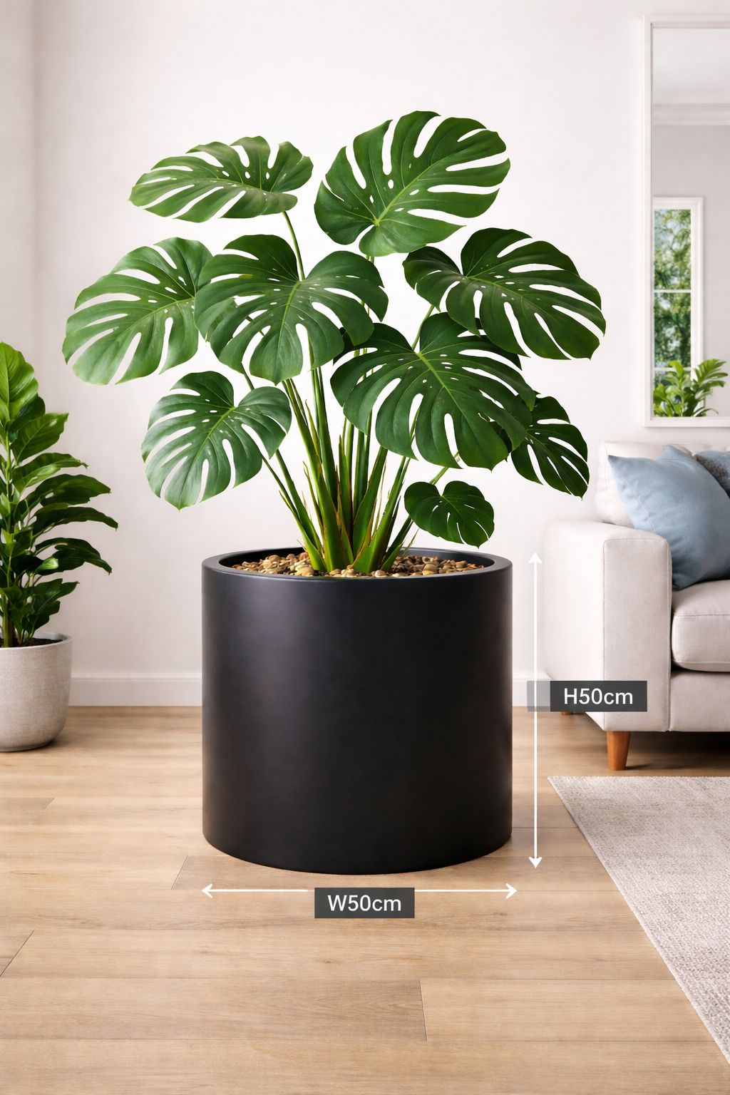 Black cedar cylinder pot with a smooth finish, measuring 23cm in diameter and height, ideal for indoor or outdoor plants.