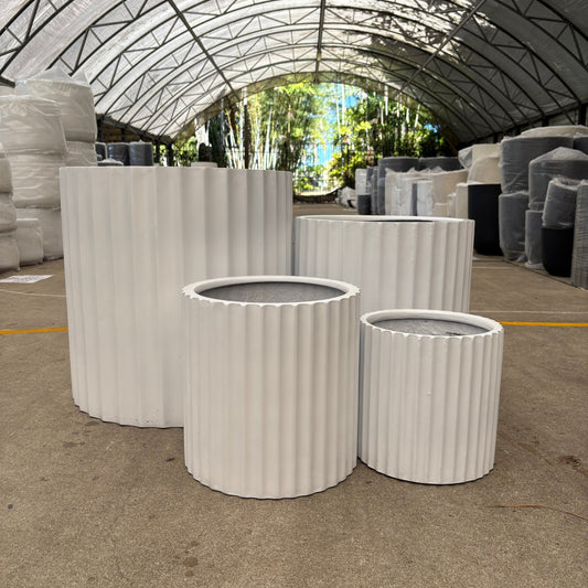 White cedar ribbed cylinder from The Nurso, showcasing its textured, ribbed surface and clean cylindrical shape.