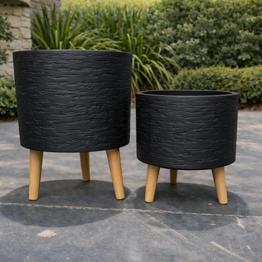 Black Tuscan Cylinder Tripod Pot by The Nurso, 27cm diameter and 35cm height, featuring a stylish tripod stand.