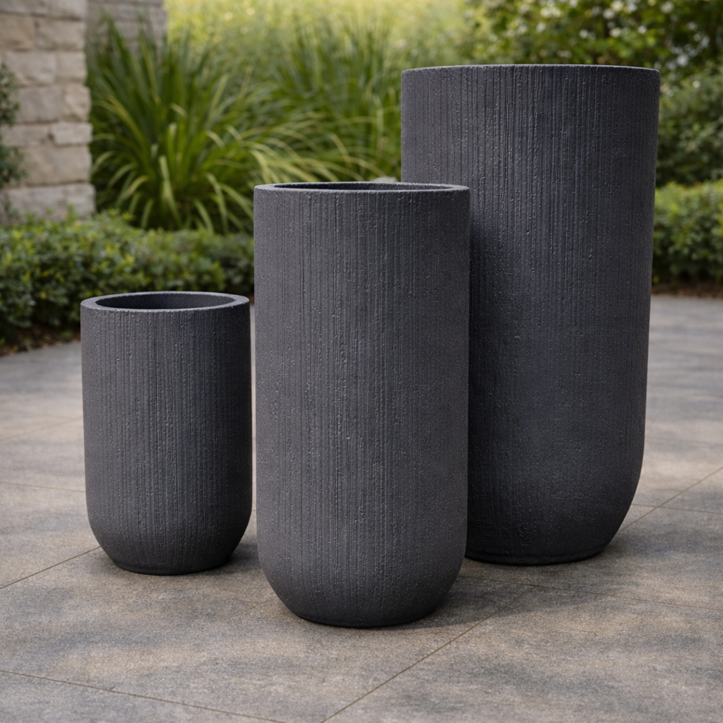 Tuscan ribbed cigar-shaped planter pot in black, 30cm wide and 57cm tall, with a textured ribbed design.