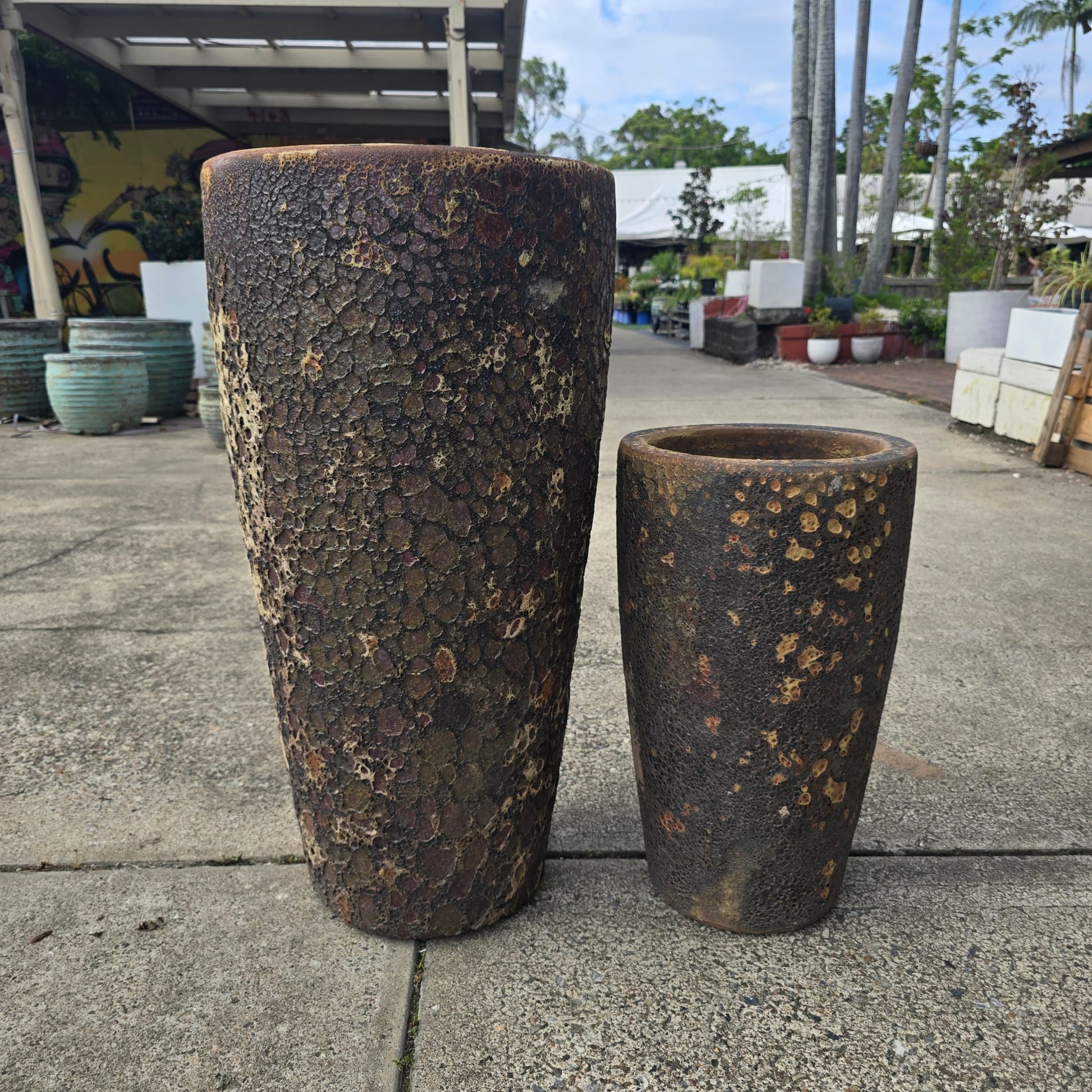 Rust-colored Atlantis Narrow U Pot by Atlantis, 30cm wide and 60cm high, featuring a sleek U-shaped design for outdoor gardening